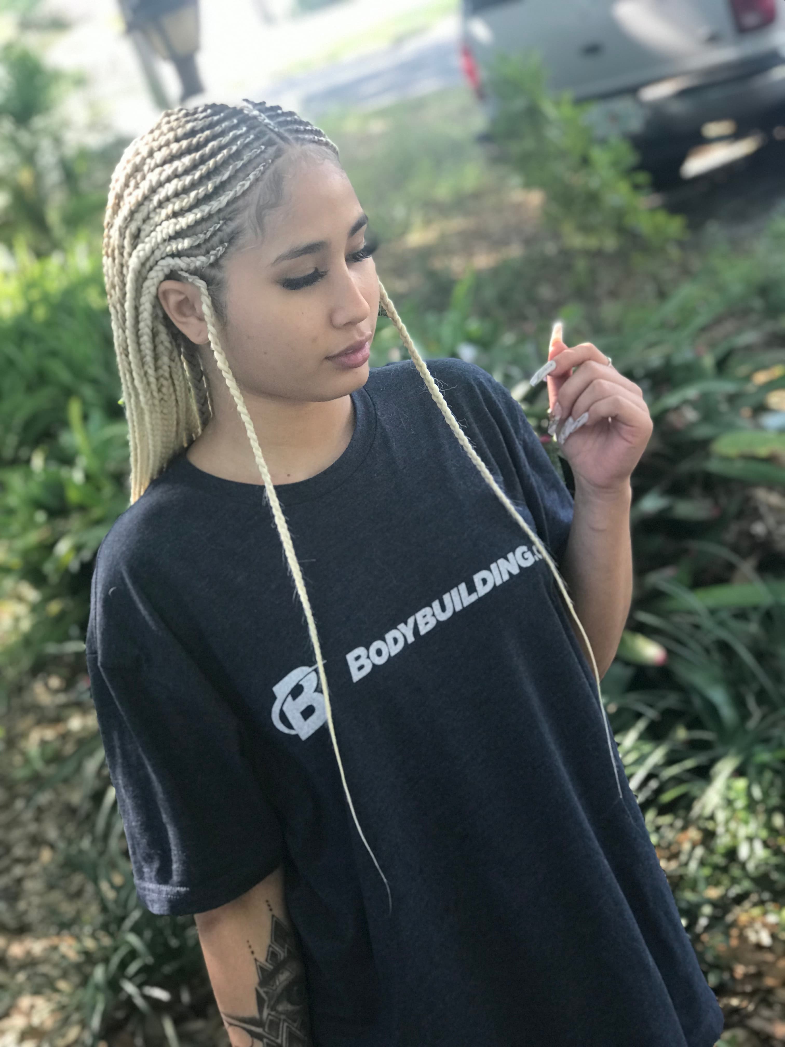 Knotless braid client portrait by BraidsByLo